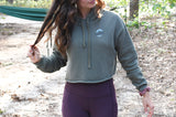 Dressing low-key stylish and comfortable fuse together in this statement piece cropped hoodie. Made for movement and hangin. This hoodie is bound to become a true go-to in your closet.   • 52% airlume combed and ring-spun cotton, 48% poly fleece • Cropped body with a raw hem • Dyed-to-match drawstrings • Dropped shoulder