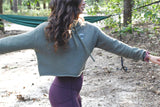 Dressing low-key stylish and comfortable fuse together in this statement piece cropped hoodie. Made for movement and hangin. This hoodie is bound to become a true go-to in your closet.   • 52% airlume combed and ring-spun cotton, 48% poly fleece • Cropped body with a raw hem • Dyed-to-match drawstrings • Dropped shoulder