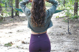 Dressing low-key stylish and comfortable fuse together in this statement piece cropped hoodie. Made for movement and hangin. This hoodie is bound to become a true go-to in your closet.   • 52% airlume combed and ring-spun cotton, 48% poly fleece • Cropped body with a raw hem • Dyed-to-match drawstrings • Dropped shoulder
